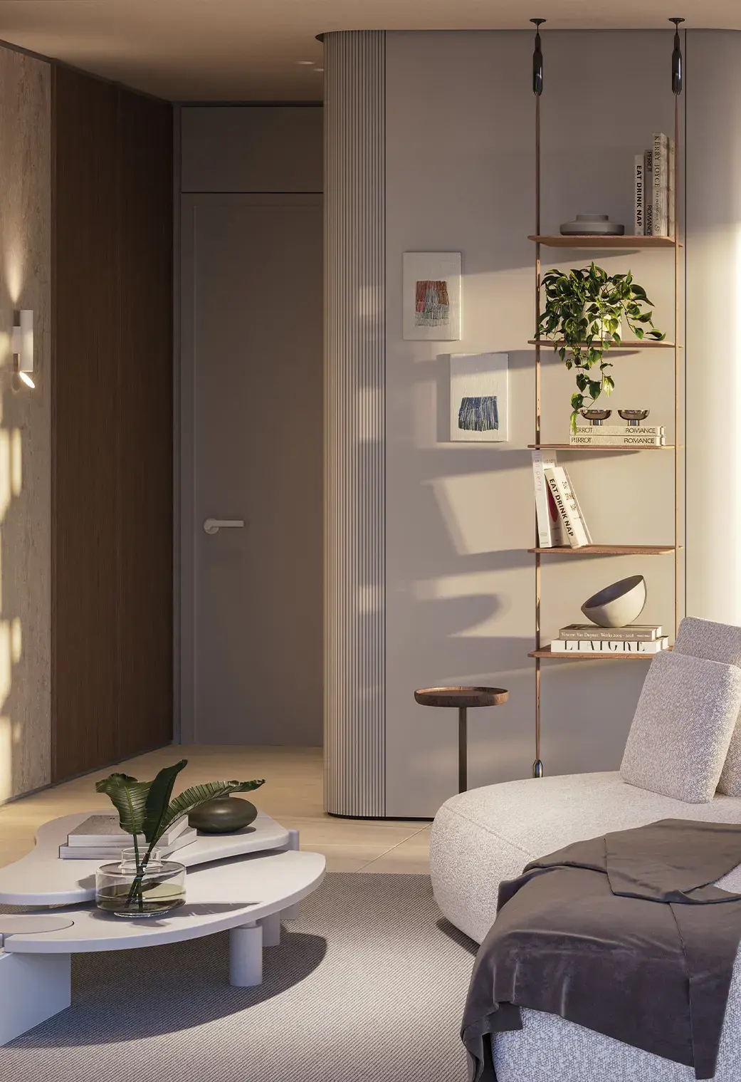 A Bioma interior: built-in shelving, an armchair and planting beside a doorway