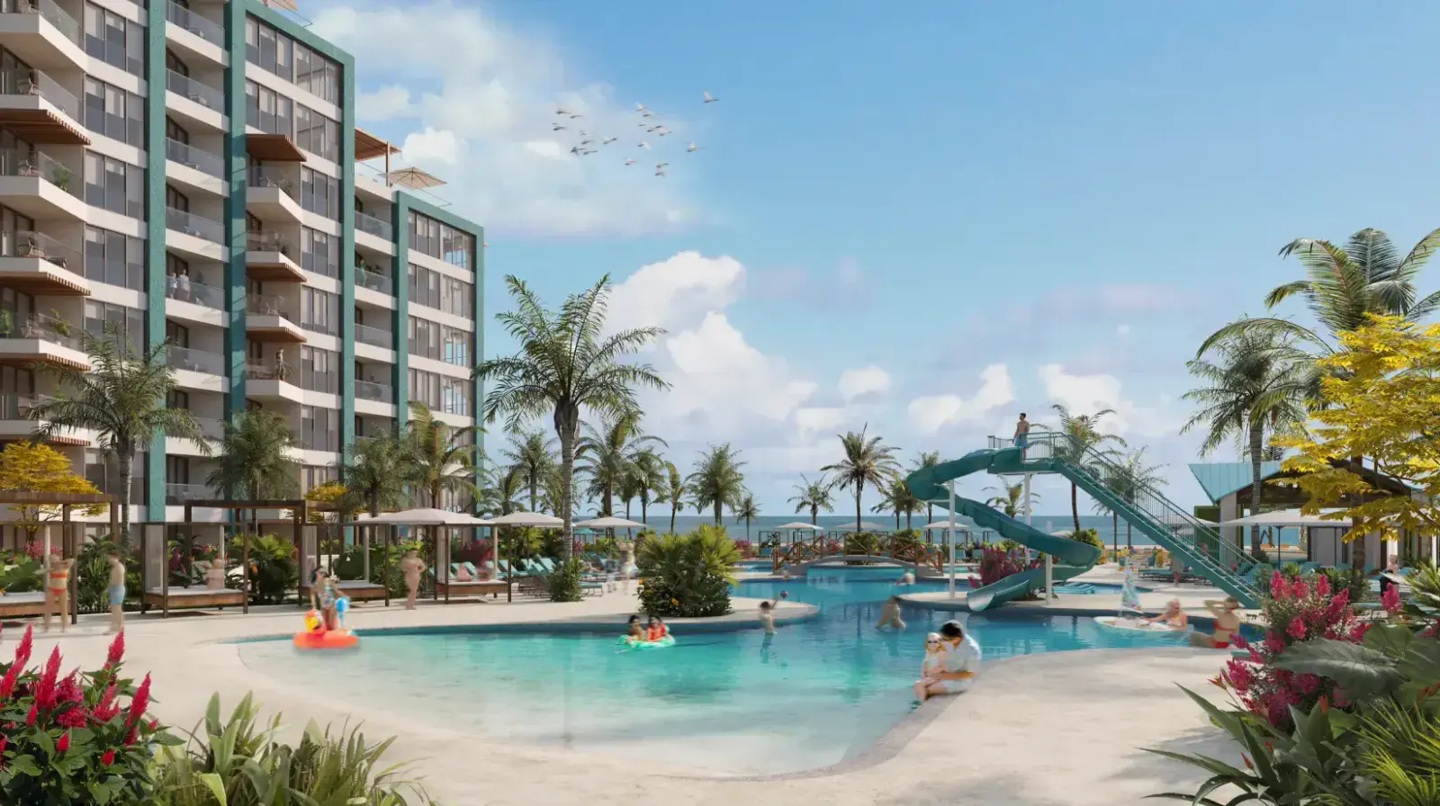 The Margaritaville pool complex, with water slides, palms and sun terraces beside the beach
