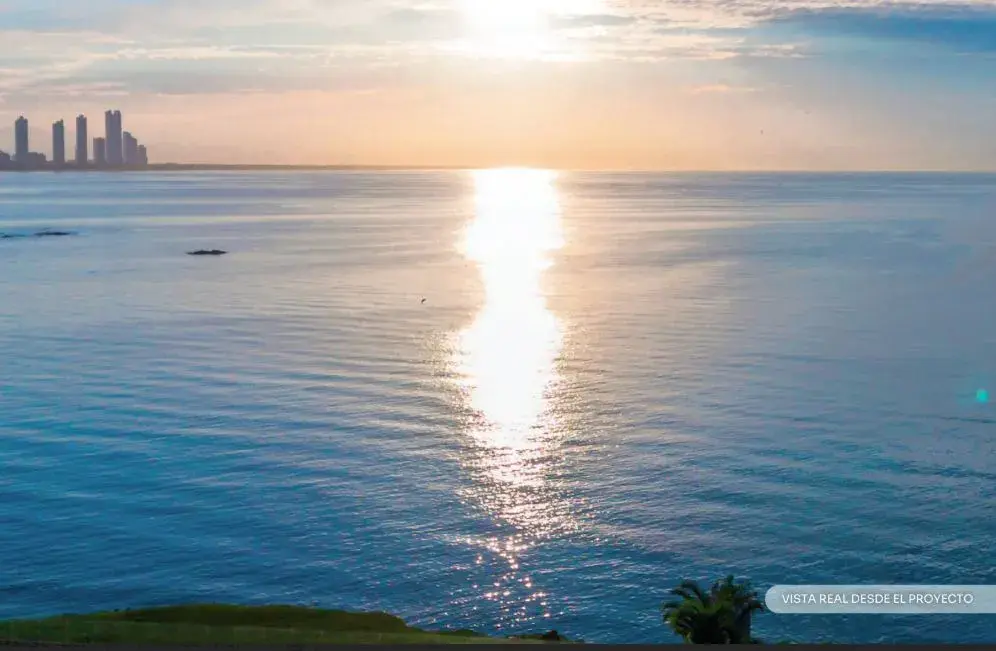 Sunset over the Pacific from Punta Pacifica, the sun reflecting across open water