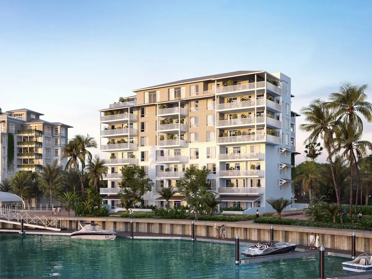 Rendering of Buenaventura's mid-rise buildings along the marina, with boats moored at the quay