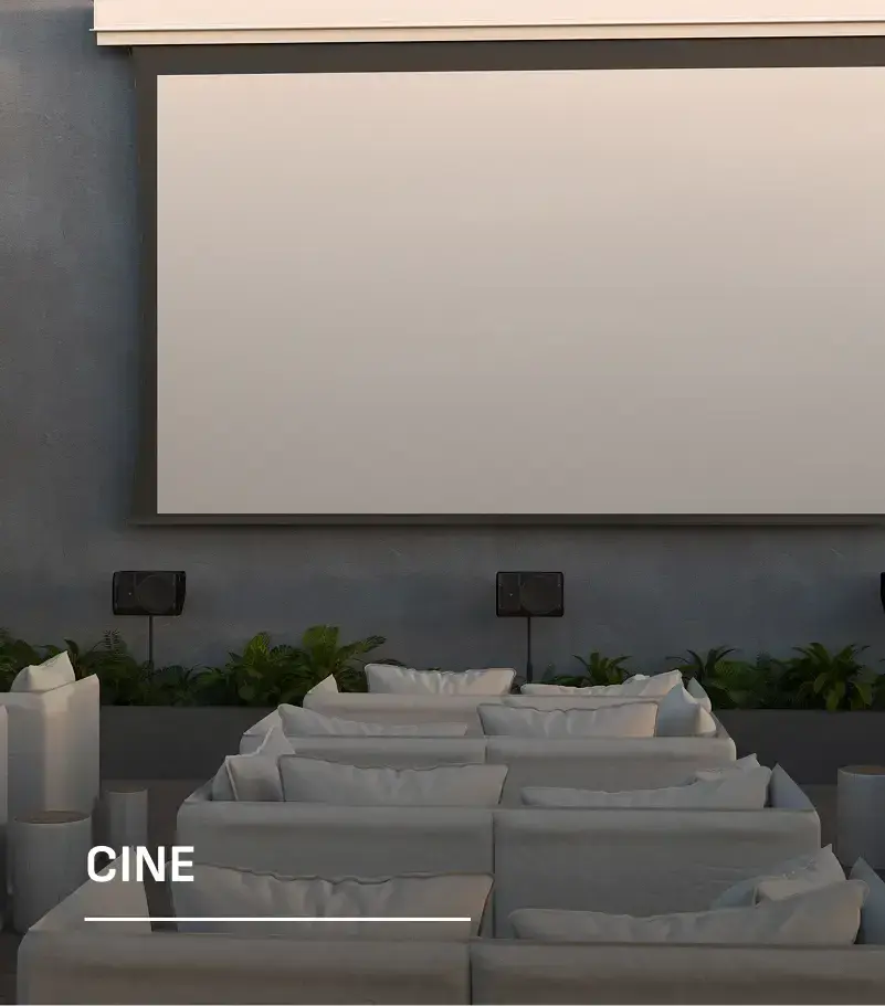 The screening room at Generation Tower, with tiered sofa seating facing a projection screen