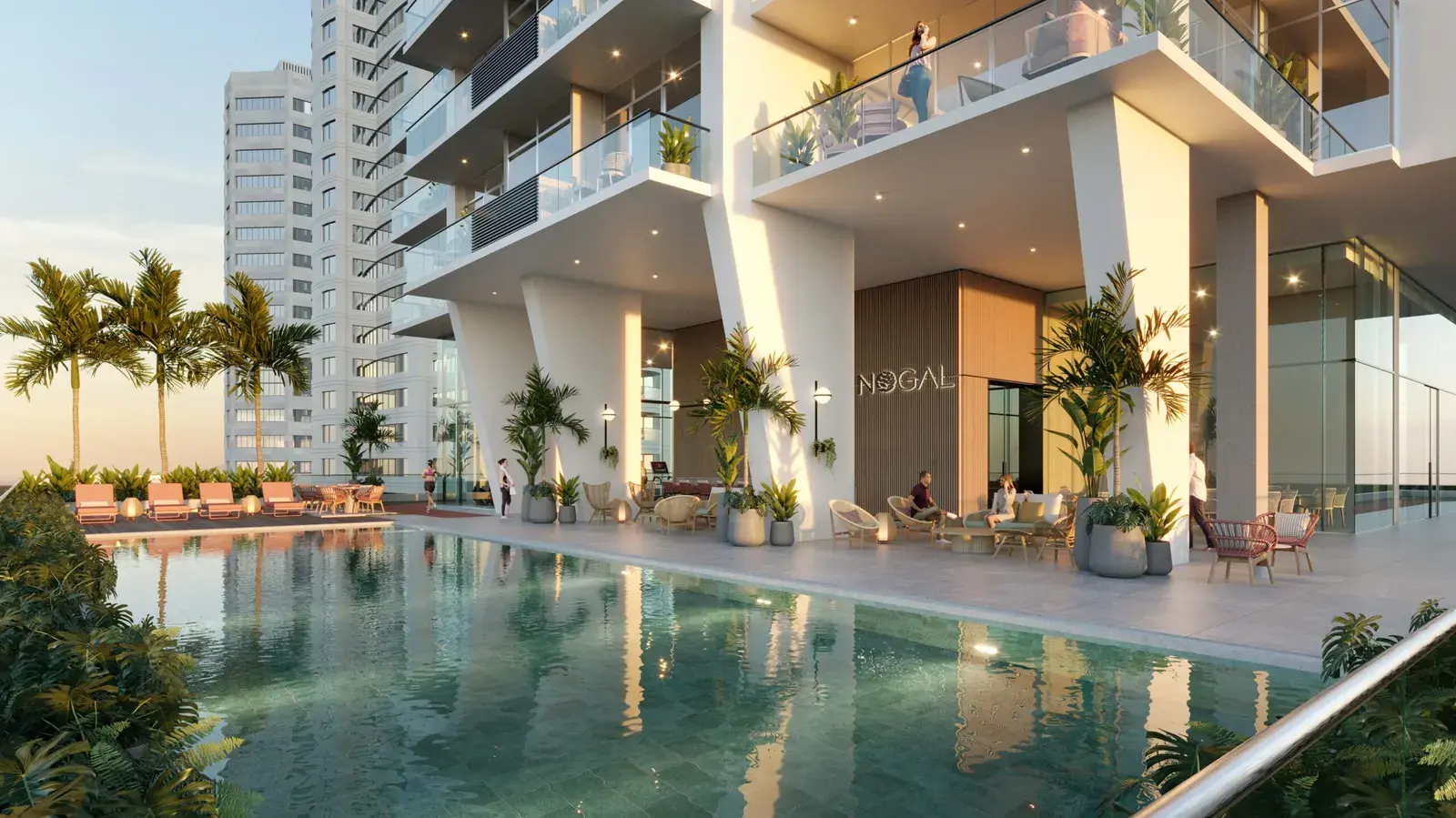 Nogal's pool terrace, with the tower's stepped balconies above and loungers along the water
