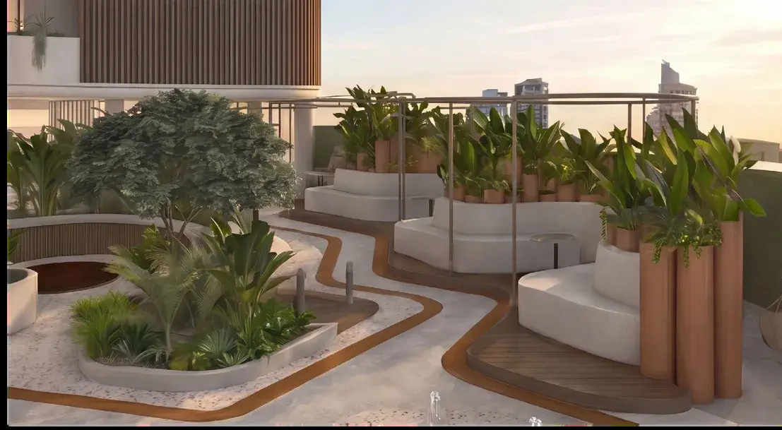 The level-6 terrace at Selvática, with curved seating, a mature tree in a planted bed and timber-clad planters against the skyline